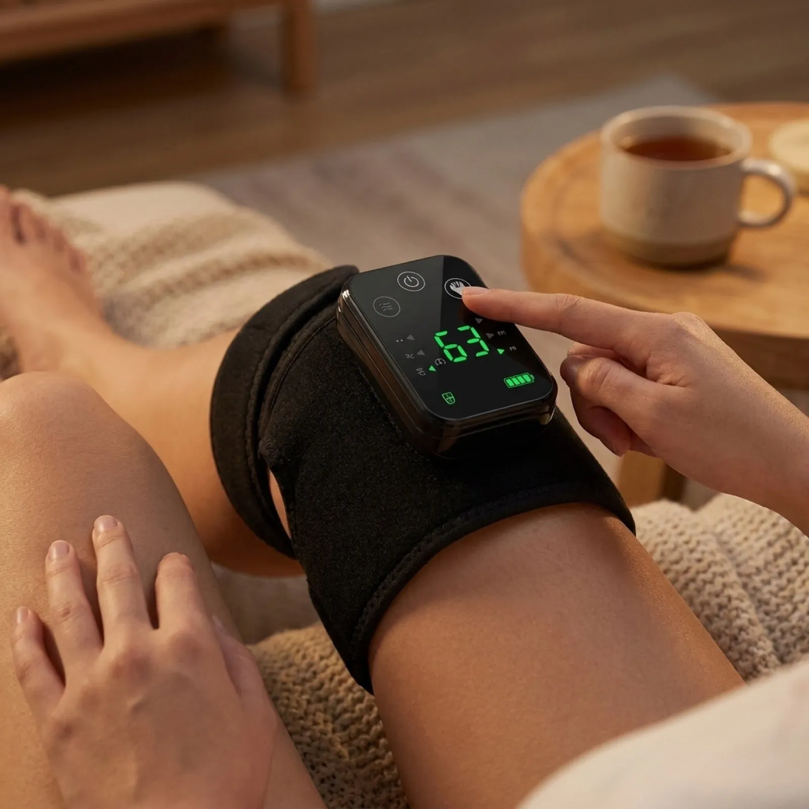 RecoverWave heat and vibration knee wrap worn on a knee